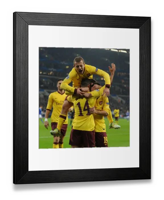 Framed Print : Theo Walcott, Santi Cazorla, and Jack Wilshere: Celebrating Arsenal's First Goal Against Schalke 04 in the 2012-13 UEFA Champions League Framed Print : Theo Walcott, Santi Cazorla, and Jack Wilshere: Celebrating Arsenal's First Goal Against Schalke 04 in the 2012-13 UEFA Champions League