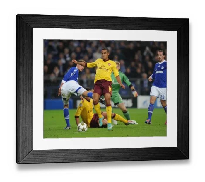 Framed Print : Theo Walcott's Stunning Goal: Arsenal's Victory over Schalke 04 in the UEFA Champions League (2012-13) - Walcott Outmaneuvers Howedes Framed Print : Theo Walcott's Stunning Goal: Arsenal's Victory over Schalke 04 in the UEFA Champions League (2012-13) - Walcott Outmaneuvers Howedes