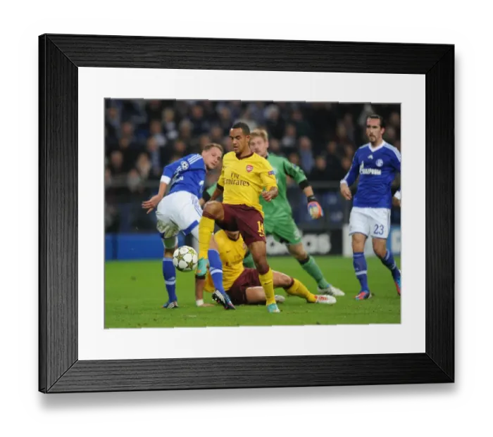 Framed Print : Theo Walcott's Historic Goal Past Benedikt Howedes: Arsenal's Triumph over Schalke 04 in the 2012-13 UEFA Champions League Framed Print : Theo Walcott's Historic Goal Past Benedikt Howedes: Arsenal's Triumph over Schalke 04 in the 2012-13 UEFA Champions League
