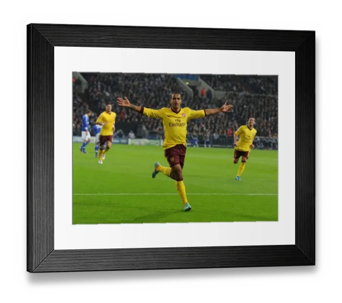 Framed Print : Theo Walcott's Historic Stunner: Arsenal's First Goal Against Schalke 04 in the 2012-13 Champions League Framed Print : Theo Walcott's Historic Stunner: Arsenal's First Goal Against Schalke 04 in the 2012-13 Champions League
