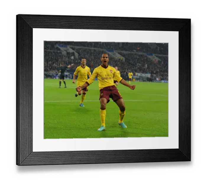 Framed Print : Theo Walcott's Historic Stunner: Arsenal's First Goal Against Schalke 04 in the 2012-13 Champions League