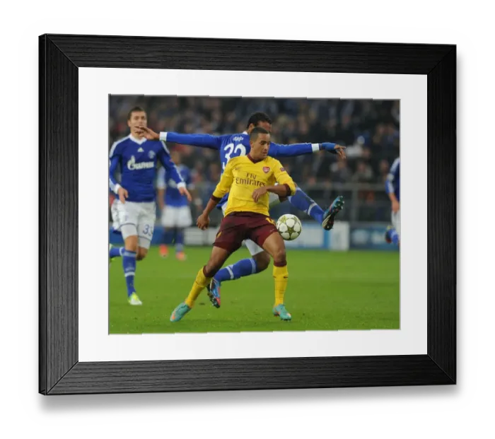 Framed Print : Theo Walcott Dashes Past Roman Neustadter: Arsenal vs. Schalke 2012-13 UEFA Champions League Framed Print : Theo Walcott Dashes Past Roman Neustadter: Arsenal vs. Schalke 2012-13 UEFA Champions League