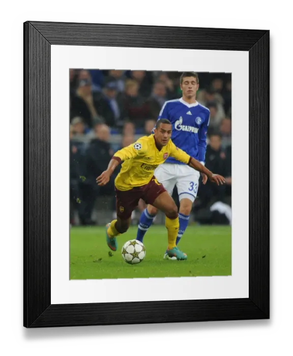 Framed Print : Theo Walcott Dashes Past Romas Neustadter: Arsenal vs. Schalke, UEFA Champions League, 2012