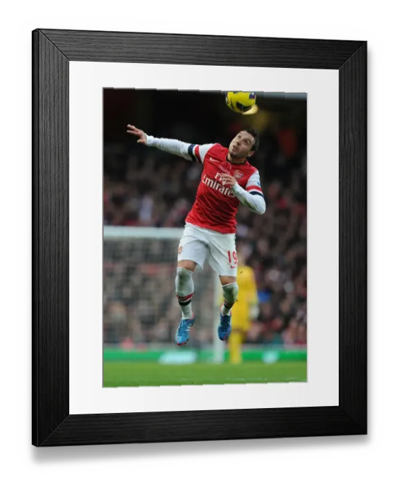 Framed Print : Arsenal's Santi Cazorla in Action against Fulham (2012-13)