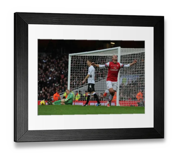 Framed Print : Lukas Podolski's Brace: Arsenal's Win Against Fulham, Premier League 2012-13