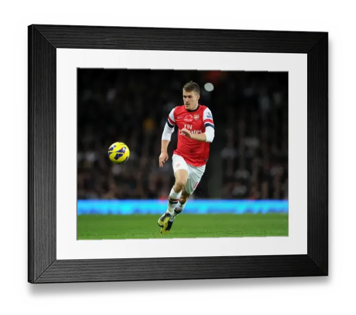 Framed Print : Aaron Ramsey (Arsenal). Arsenal 3: 3 Fulham. Barclays Premier League. Emirates Stadium, 10  /  11  /  12