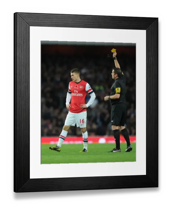 Framed Print : Arsenal's Aaron Ramsey Booked by Referee during Arsenal v Fulham Match, Premier League 2012-13