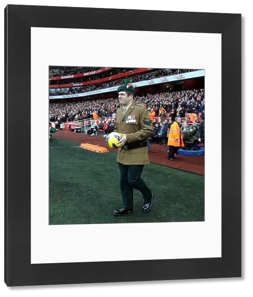 A Soldier brings on the matchball. Arsenal 3: 3 Fulham. Barclays Premier League. Emirates Stadium