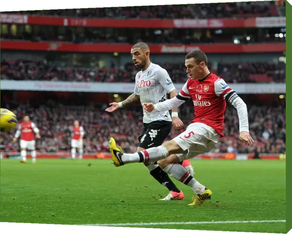 Thomas Vermaelen (Arsenal) Ashkan Dejagah (Fulham). Arsenal 3: 3 Fulham. Barclays Premier League