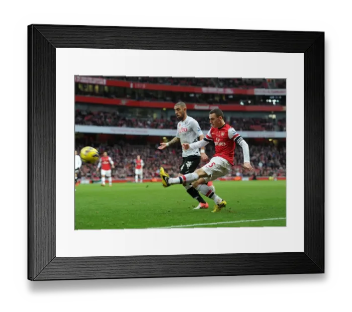 Framed Print : Thomas Vermaelen (Arsenal) Ashkan Dejagah (Fulham). Arsenal 3: 3 Fulham. Barclays Premier League Framed Print : Thomas Vermaelen (Arsenal) Ashkan Dejagah (Fulham). Arsenal 3: 3 Fulham. Barclays Premier League