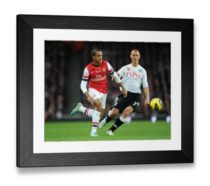 Framed Print : Theo Walcott vs Steve Sidwell: Clash at Emirates Stadium (Arsenal v Fulham, 2012-13)