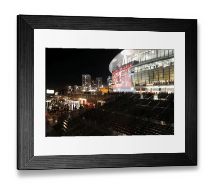 Framed Print : Arsenal FC vs Montpellier Herault SC: UEFA Champions League Clash at Emirates Stadium, London, 2012