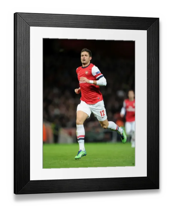 Framed Print : Olivier Giroud in Action for Arsenal against Montpellier (UEFA Champions League 2012-13)