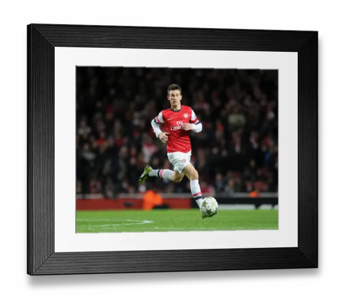 Framed Print : Arsenal's Koscielny in Action against Montpellier (2012-13)