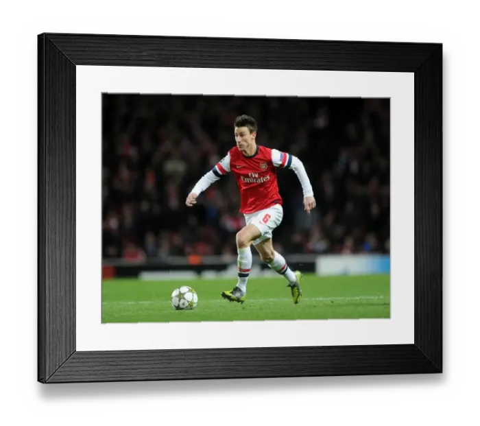 Framed Print : Arsenal's Koscielny in Action against Montpellier (UEFA Champions League 2012-13)