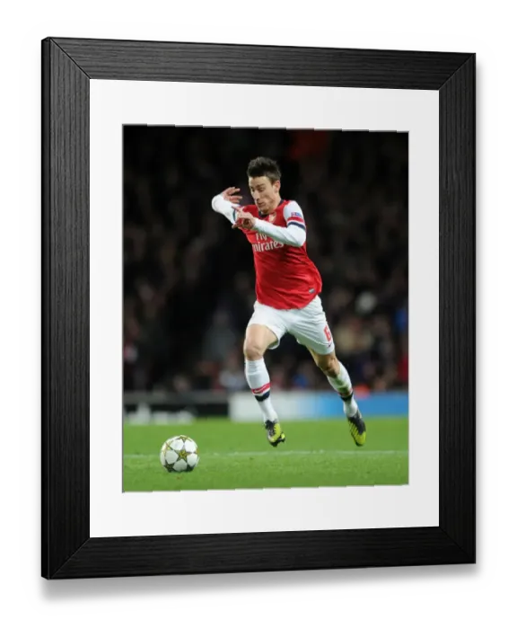 Framed Print : Arsenal's Koscielny in Action: Arsenal vs. Montpellier (UEFA Champions League 2012-13) Framed Print : Arsenal's Koscielny in Action: Arsenal vs. Montpellier (UEFA Champions League 2012-13)