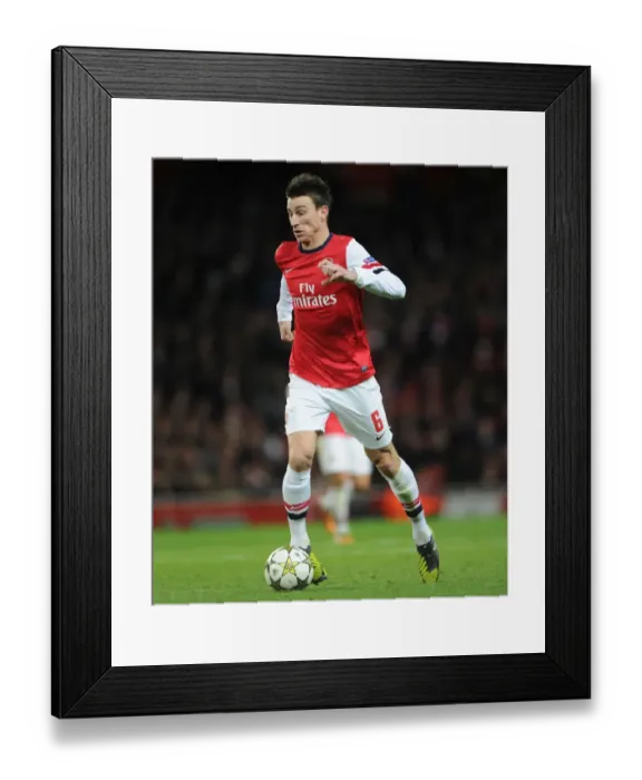 Framed Print : Arsenal's Koscielny in Action: Arsenal vs. Montpellier (Champions League 2012-13)