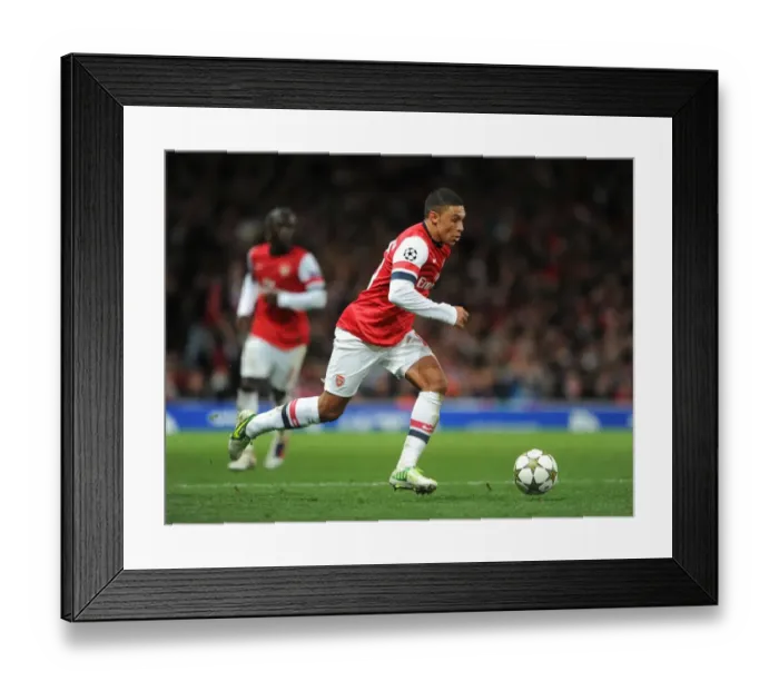 Framed Print : Alex Oxlade-Chamberlain in Action: Arsenal vs Montpellier, UEFA Champions League (2012)