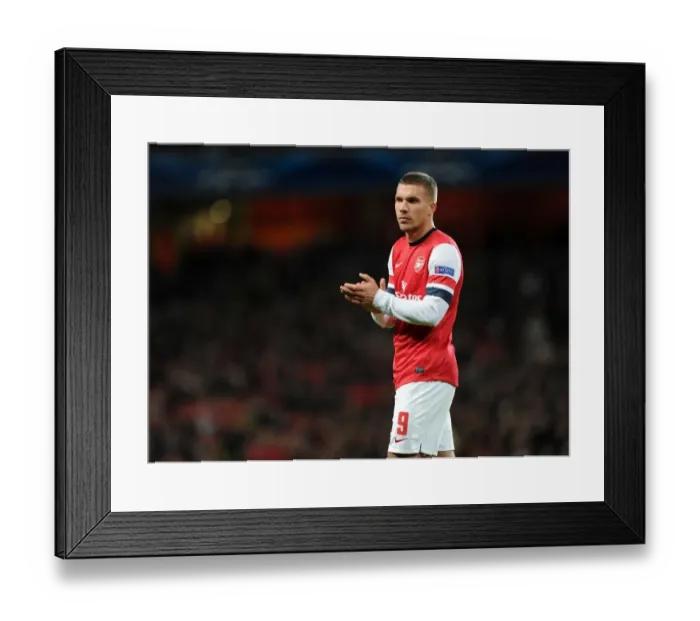 Framed Print : Lukas Podolski in Action: Arsenal vs Montpellier, UEFA Champions League, 2012