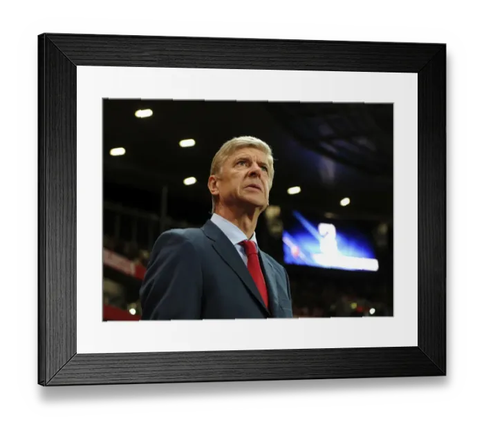 Framed Print : Arsene Wenger Leading Arsenal in the UEFA Champions League against Montpellier (2012)