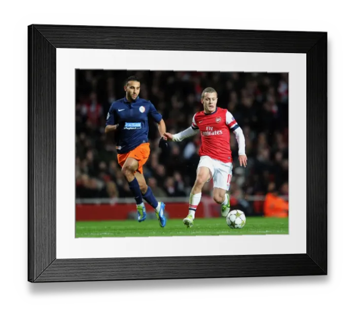 Framed Print : Jack Wilshere (Arsenal) Abdel El Kaoutari (Montpellier). Arsenal 2: 0 Montpellier Framed Print : Jack Wilshere (Arsenal) Abdel El Kaoutari (Montpellier). Arsenal 2: 0 Montpellier
