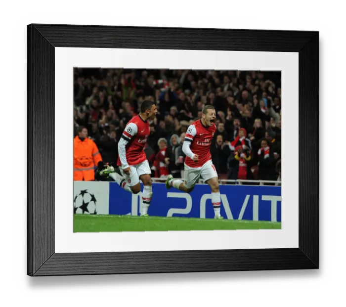 Framed Print : Jack Wilshere and Alex Oxlade-Chamberlain Celebrate Arsenal's First Goal vs Montpellier (2012-13) Framed Print : Jack Wilshere and Alex Oxlade-Chamberlain Celebrate Arsenal's First Goal vs Montpellier (2012-13)