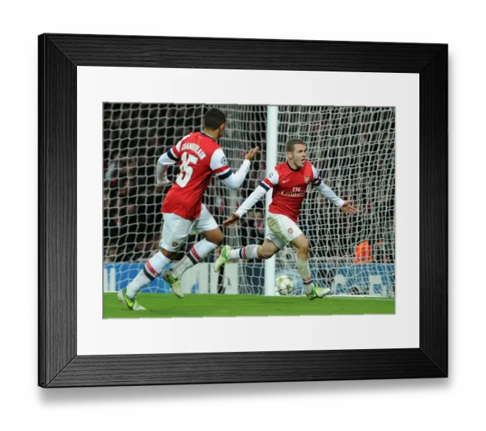 Framed Print : Arsenal's Wilshere and Oxlade-Chamberlain Celebrate Goal Against Montpellier (2012-13)