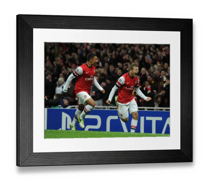Framed Print : Arsenal Duo: Jack Wilshere and Alex Oxlade-Chamberlain Celebrate First Goals Against Montpellier (2012-13)