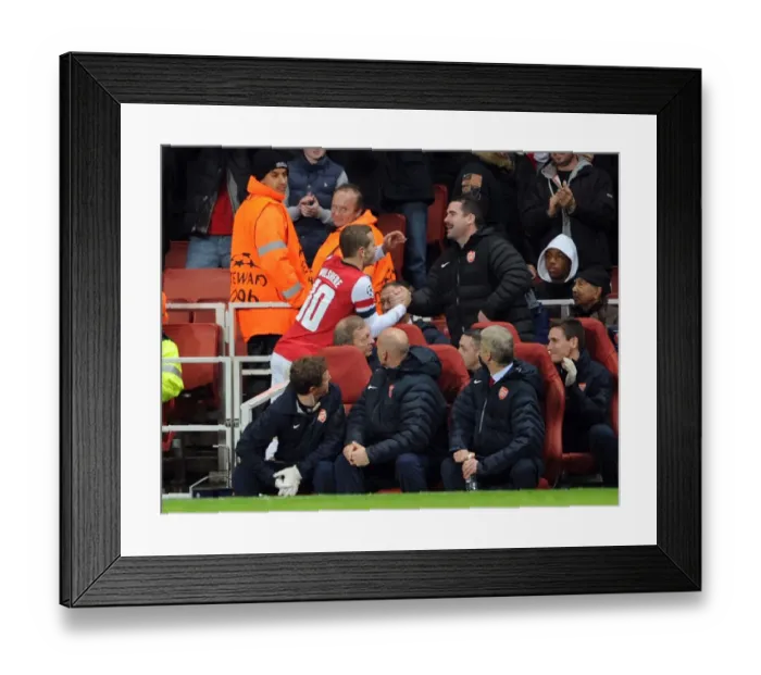Framed Print : Jack Wilshere's Emotional Goal Celebration with Declan Lynch (Arsenal vs Montpellier, 2012-13) Framed Print : Jack Wilshere's Emotional Goal Celebration with Declan Lynch (Arsenal vs Montpellier, 2012-13)