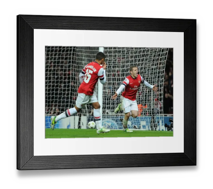 Framed Print : Arsenal Duo: Wilshere and Oxlade-Chamberlain Celebrate First Goal in Champions League Victory Framed Print : Arsenal Duo: Wilshere and Oxlade-Chamberlain Celebrate First Goal in Champions League Victory