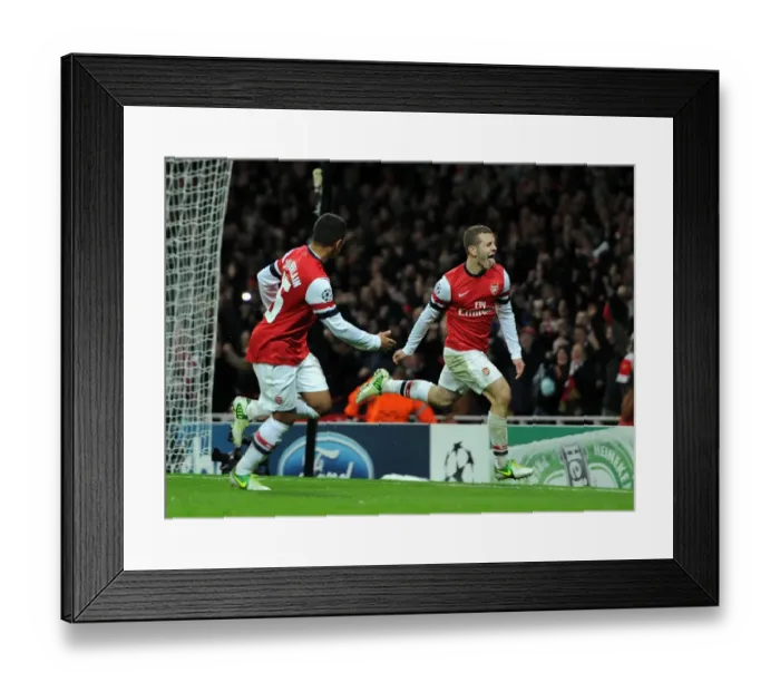 Framed Print : Arsenal's Jack Wilshere and Alex Oxlade-Chamberlain Celebrate First Goal Against Montpellier (2012-13)