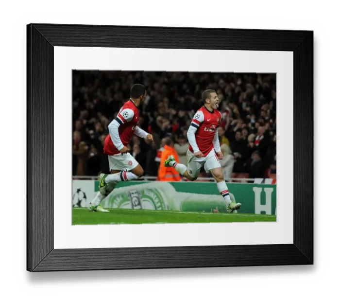 Framed Print : Arsenal's Wilshere and Oxlade-Chamberlain Celebrate Goal Against Montpellier (2012-13) Framed Print : Arsenal's Wilshere and Oxlade-Chamberlain Celebrate Goal Against Montpellier (2012-13)