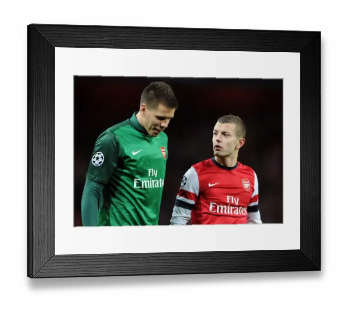 Framed Print : Arsenal FC: Jack Wilshere and Wojciech Szczesny in Deep Conversation After Arsenal v Montpellier UEFA Champions League Match (2012-13)