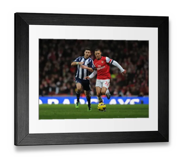 Framed Print : Arsenal's Kieran Gibbs Outmaneuvers West Brom's Shane Long Framed Print : Arsenal's Kieran Gibbs Outmaneuvers West Brom's Shane Long