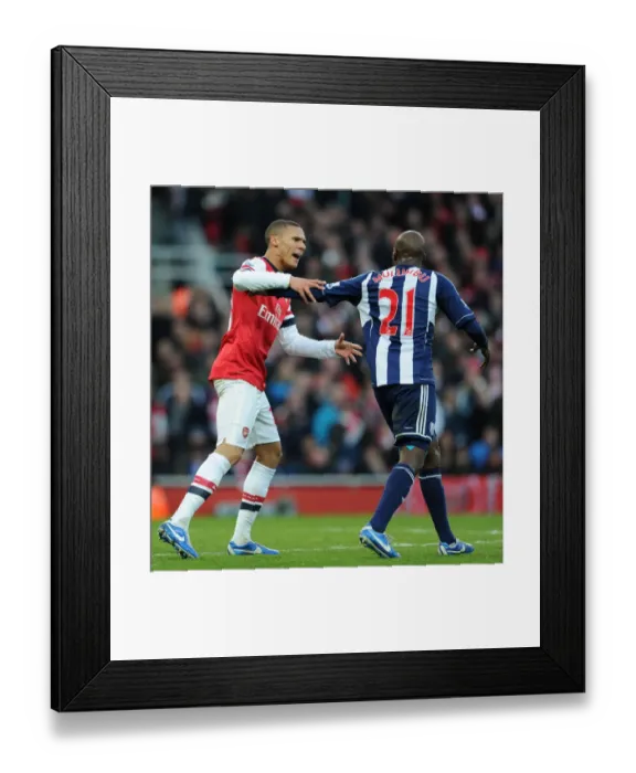 Framed Print : A Fight for Possession: Gibbs vs. Mulumbu - Arsenal vs. West Bromwich Albion