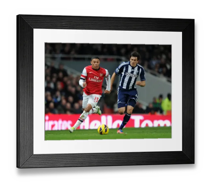 Framed Print : Arsenal's Alex Oxlade-Chamberlain Faces Off Against West Bromwich Albion's Goran Popov (2012-13)