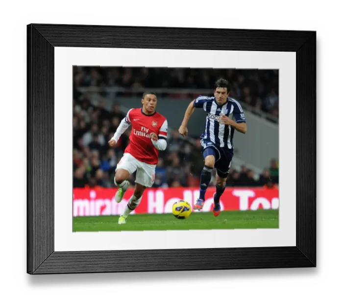 Framed Print : Arsenal's Alex Oxlade-Chamberlain vs. Goran Popov: A Battle at Emirates Stadium (2012-13)