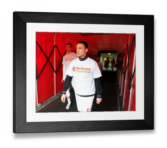 Framed Print : Thomas Vermaelen (Arsenal) walks out to warm up in his Arsenal Foundation t shirt Framed Print : Thomas Vermaelen (Arsenal) walks out to warm up in his Arsenal Foundation t shirt