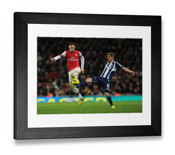 Framed Print : Vermaelen vs. Rosenberg: A Premier League Showdown at Emirates Stadium Framed Print : Vermaelen vs. Rosenberg: A Premier League Showdown at Emirates Stadium