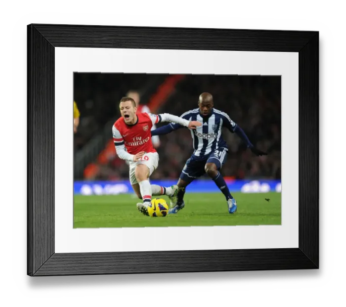 Framed Print : Intense Premier League Clash: Jack Wilshere Fouls Youssouf Mulumbu (Arsenal vs. West Bromwich Albion, 2012-13)