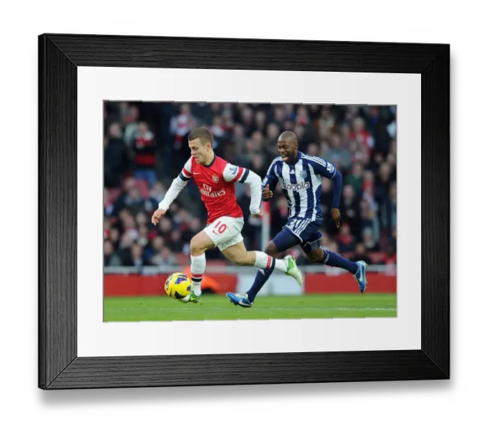Framed Print : Midfield Showdown: Jack Wilshere vs Youssouf Mulumbu, Arsenal vs West Bromwich Albion, Premier League 2012-13 Framed Print : Midfield Showdown: Jack Wilshere vs Youssouf Mulumbu, Arsenal vs West Bromwich Albion, Premier League 2012-13