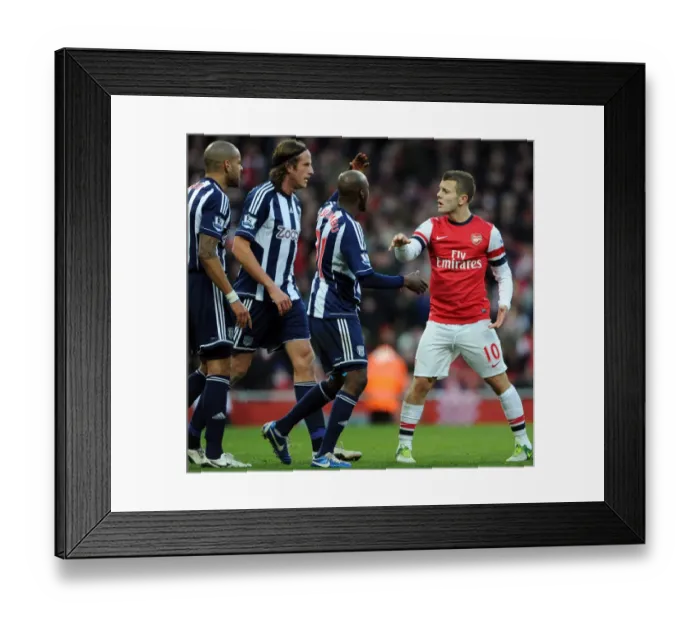 Framed Print : Intense Rivalry: Wilshere vs. Reid, Olsson, and Mulumbu Clash in Arsenal vs. West Bromwich Albion Showdown