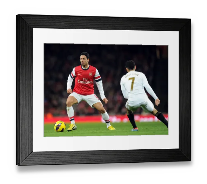 Framed Print : Arsenal's Mikel Arteta Fends Off Swansea's Leon Britton in 2012-13 Premier League Clash Framed Print : Arsenal's Mikel Arteta Fends Off Swansea's Leon Britton in 2012-13 Premier League Clash