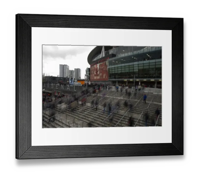 Framed Print : Arsenal fans walk up to Emirates Stadium. Arsenal 0: 2 Swansea. Barclays Premier League
