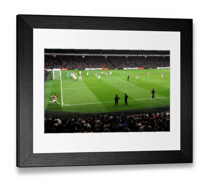 Framed Print : Theo Walcott (Arsenal) takes a corner during the match. Arsenal 0: 2 Swansea. Barclays Framed Print : Theo Walcott (Arsenal) takes a corner during the match. Arsenal 0: 2 Swansea. Barclays