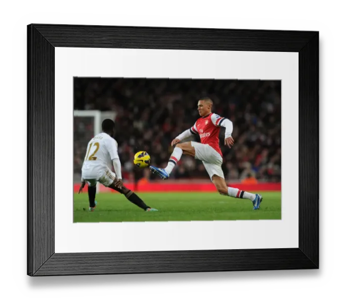Framed Print : Arsenal vs Swansea: Kieran Gibbs vs Nathan Dyer Clash in Premier League Showdown (December 2012) Framed Print : Arsenal vs Swansea: Kieran Gibbs vs Nathan Dyer Clash in Premier League Showdown (December 2012)