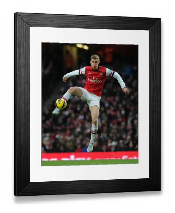 Framed Print : Per Mertesacker in Action: Arsenal vs Swansea City, 2012-13 Premier League Framed Print : Per Mertesacker in Action: Arsenal vs Swansea City, 2012-13 Premier League
