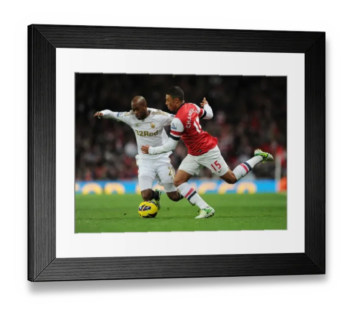 Framed Print : Arsenal's Oxlade-Chamberlain vs. Swansea's Tiendalli: A Premier League Battle
