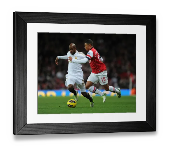 Framed Print : Clash of Talents: Oxlade-Chamberlain vs. Tiendalli - Arsenal vs. Swansea, 2012