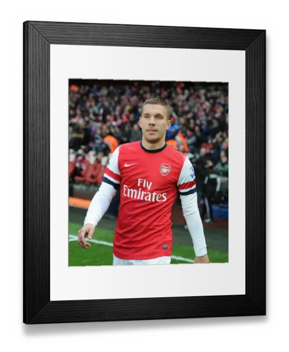 Framed Print : Arsenal's Lukas Podolski Readies for Swansea City Clash in 2012-13 Premier League Framed Print : Arsenal's Lukas Podolski Readies for Swansea City Clash in 2012-13 Premier League